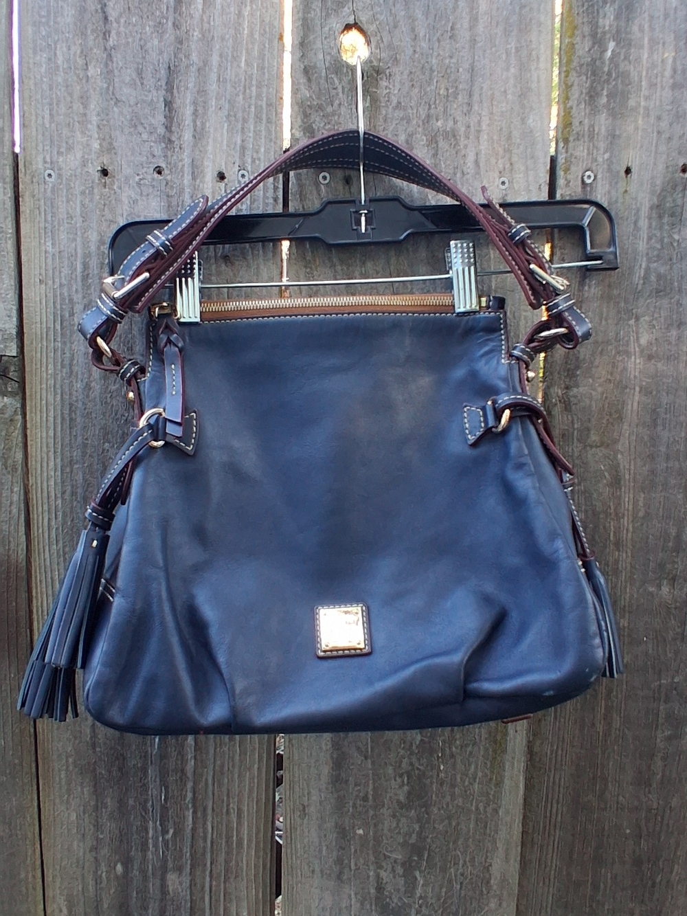 Dooney & Bourke Navy Leather Shoulder Bag with Brown Trim and Tassel